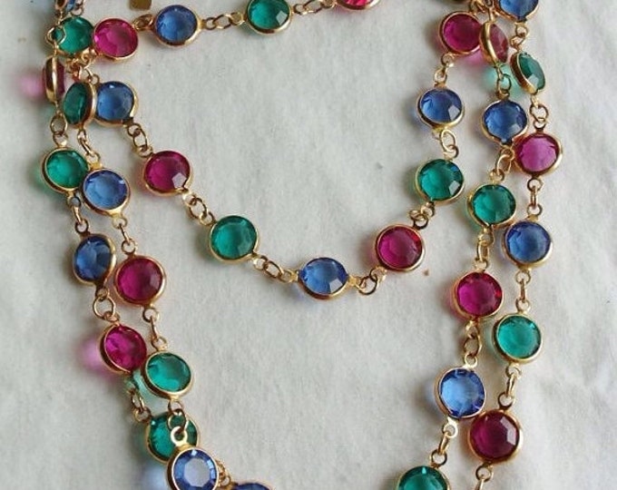 Storewide 25% Off SALE Vintage Gold Tone Faceted Swarovski Crystal Designer Signed Necklace Featuring Double Looping Design With Assorted Co