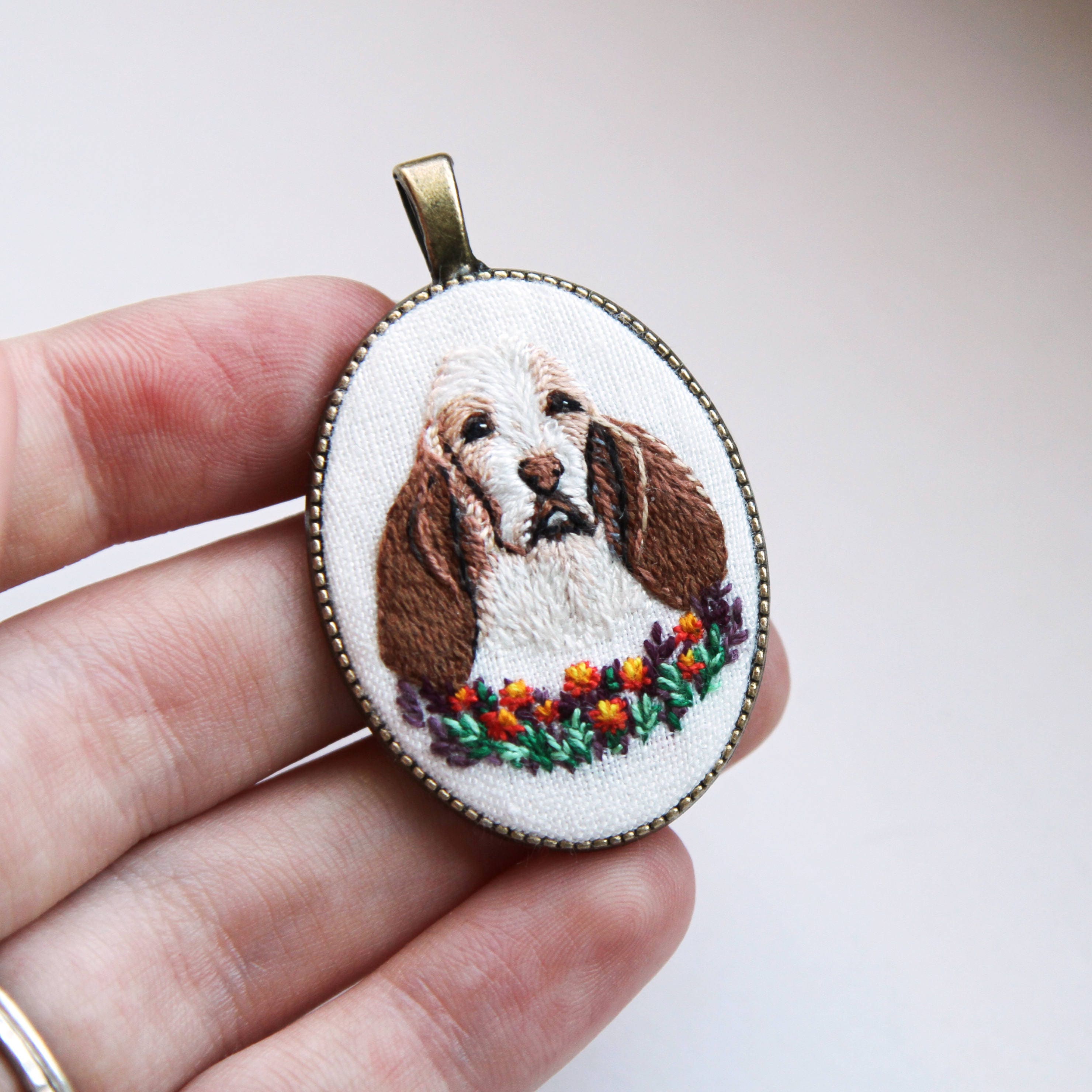 Custom embroidered pet portrait necklace. Pet portrait