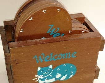 Wooden Crate With 6 Heart Shaped Coasters With A Blue And White Cat On The Front/Welcome/Great Used Condtion (P)