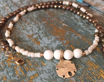 Gold and white, bracelet, beaded, bracelets, double bracelet, white bracelet, dollar charm, bracelet