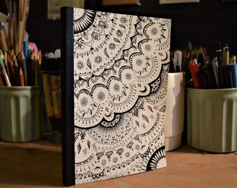 Notebook or Sketch-book.
