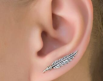 leaf ear climbers. curved ear climber. silver ear crawler. silver ear climber. ear crawler earrings. climbing earring . leaf ear crawler