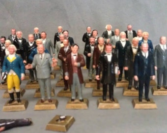 mini president statues