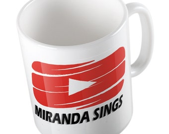 Miranda sings red play button mug