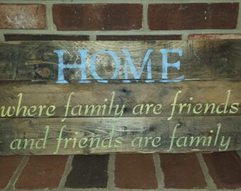 Hand-painted sign on reclaimed wood