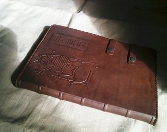 Handmade Leather cover for tablet from natural brown leather in asian style.