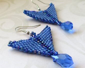 Blue beaded earrings with swarovski crystal.