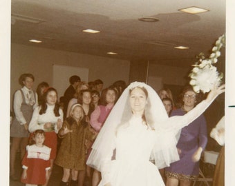 Vintage photo 1970 Color Snapshot Bride Tossing Bridal Bouquet into Air