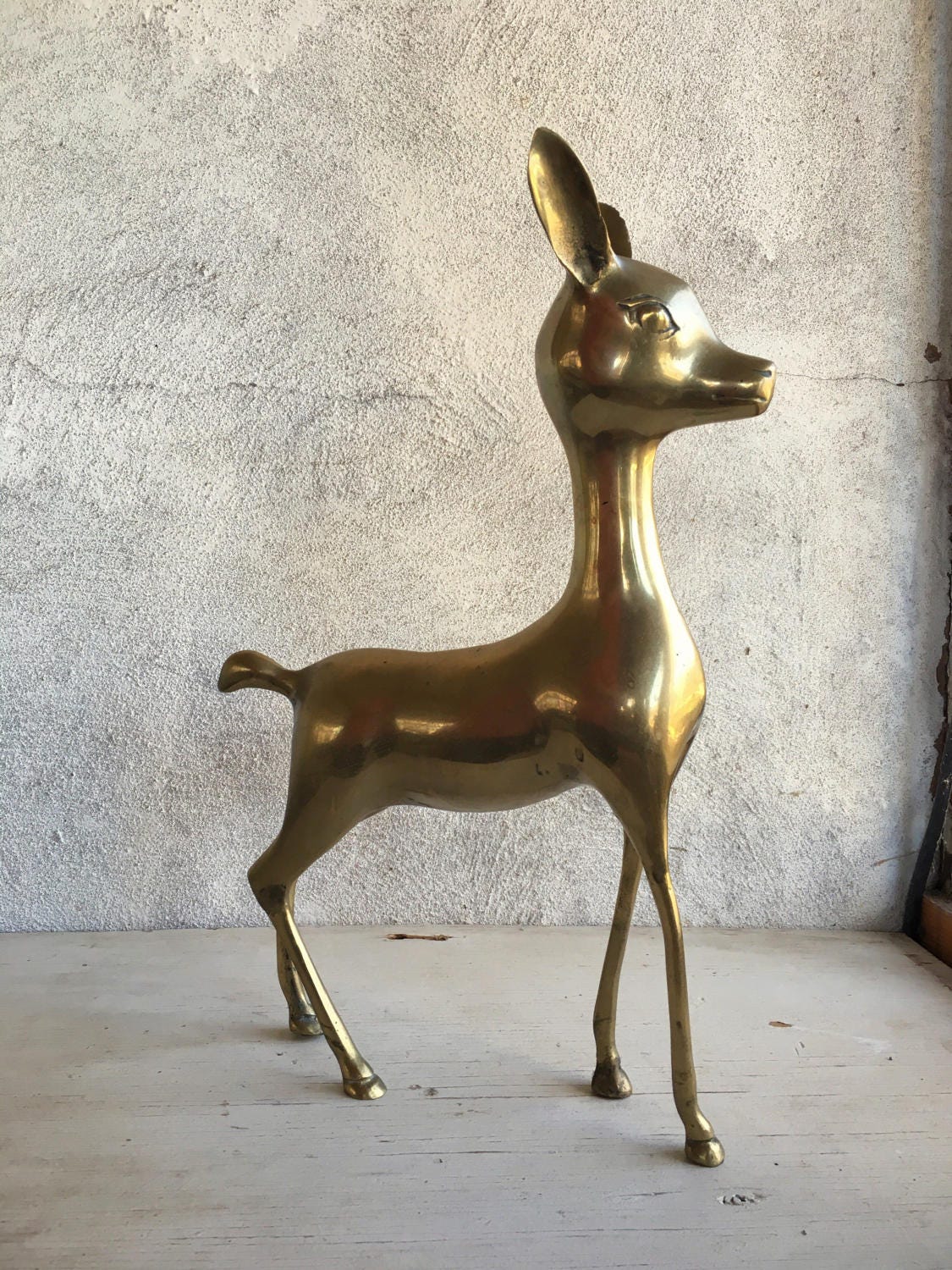 Pair large Midcentury Modern brass deer figurines, buck doe family