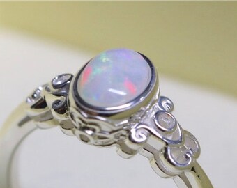 Australian Opal Ring Crystal Opal and Tanzanite by OpalEmbers