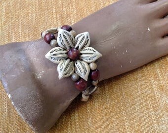 Wide cuff bracelet natural seed pods wooden wood beads beaded bold flower shape adjustable hippie bohemian boho chic tribal costume jewelry