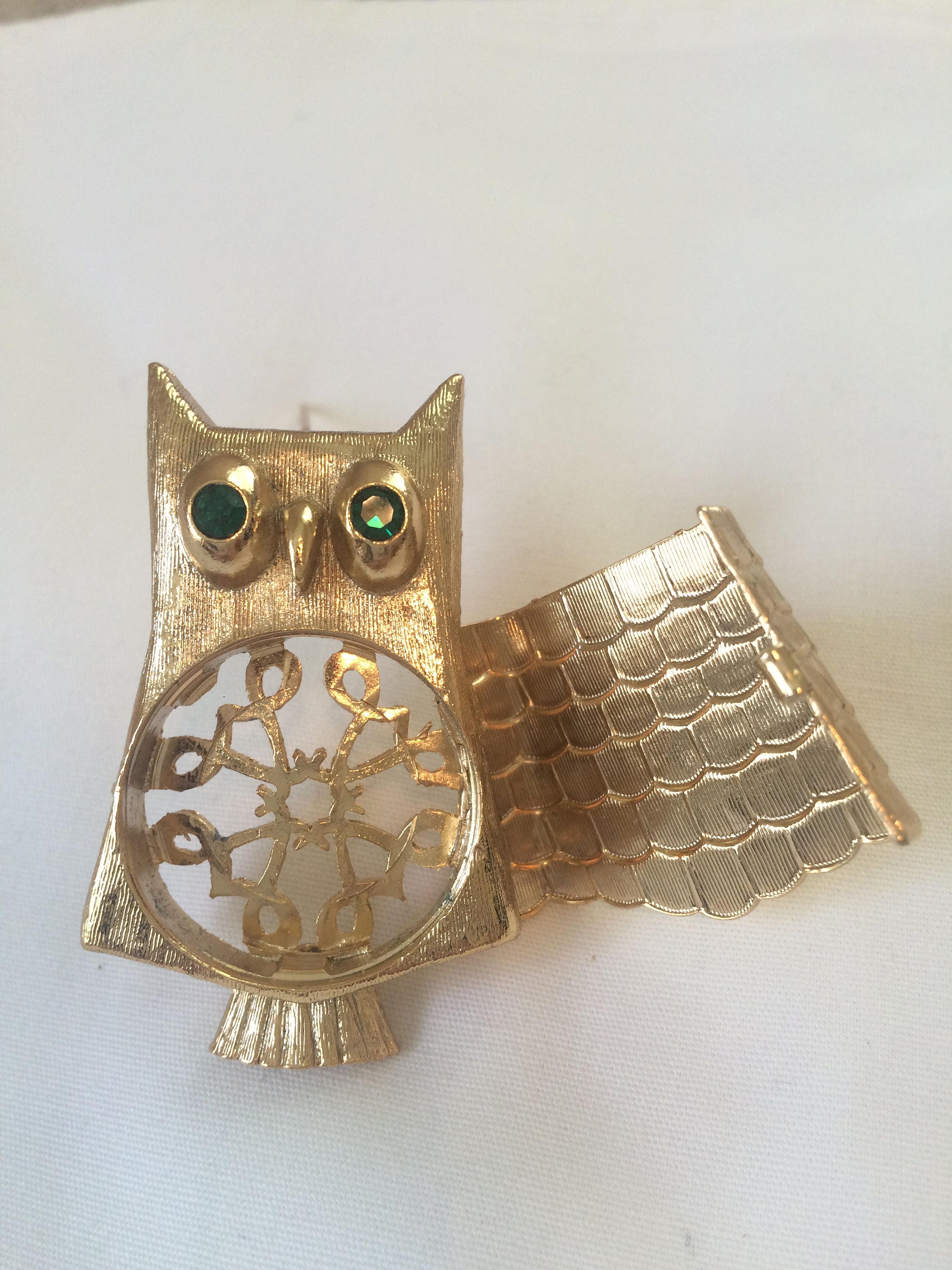 vintage Avon owl brooch with green rhinestone eyes
