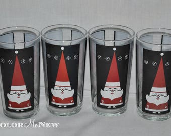 Set of 4 Vintage Atomic Santa Claus Glasses - Black, Red, and White