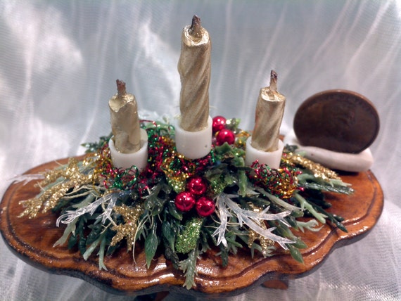 Beautiful traditional table centrepiece with greenery and gold candles - How to Decorate Your Dollhouse For Christmas in 1:12 Scale - Divine Miniatures