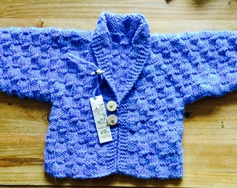 Boys or girls hand knitted cardigan/ jacket. Ages 6 to nine months or nine months to a year. Made to order in any color.