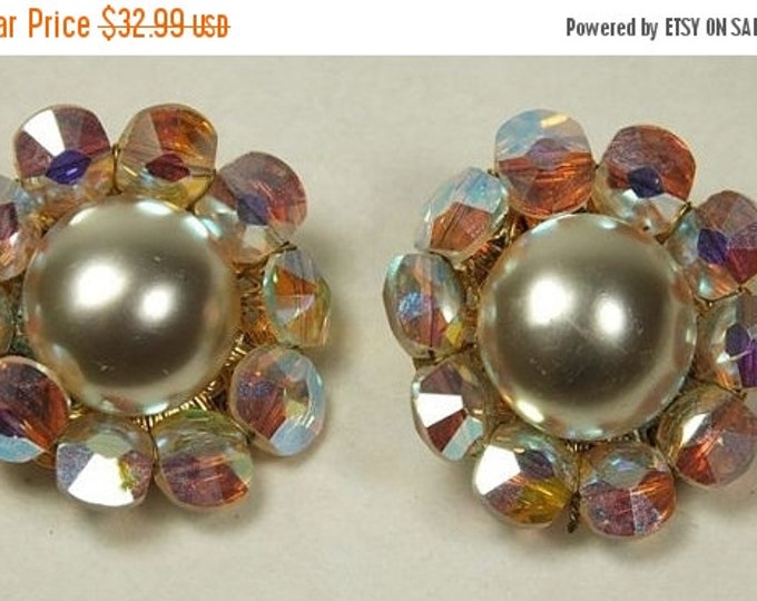 Storewide 25% Off SALE Vintage MARVELLA rhinestone and faux pearl clip 1" earrings. Aurora borealis rhinestones sparkle around the faux butt