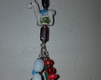 Ceramic alpaca charm and glass bead necklace