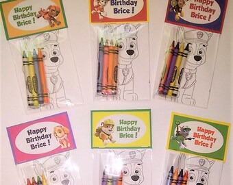 12 Sets of Personalized Paw Patrol Birthday Party Favor Bags with mini coloring pages and crayons