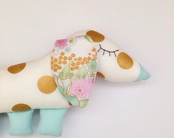 Gold polka dot sausage dog plushie