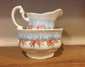 A darling sugar bowl and milk jug