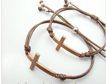 Cross adjustable cord bracelet
