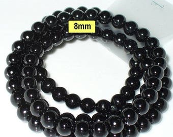 1 strand 82cm = 114 glass beads 8 mm black (808.02.1)