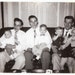 Original Vintage Polaroid Photograph Snapshot Men Sitting on Couch Holding Baby Boys & Girl Toddlers 1960s