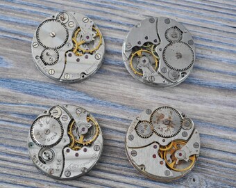 0.9 inch Set of 4 vintage wrist watch movements.