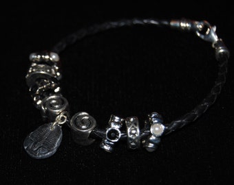Braided Leather Bracelet with Trilobite Charm and Sterling Silver Clasp