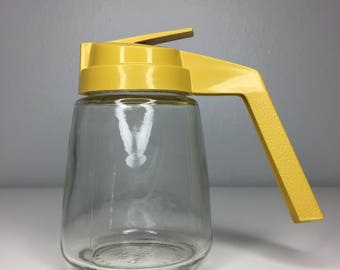 vintage yellow Federal Housewares syrup dispenser