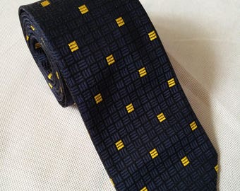 Vintage Harvie and Hudson necktie deep blue with gold bars in a geometric pattern