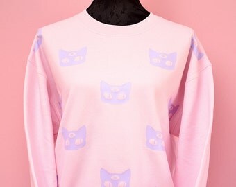 pink pastel goth oversize cute and comfy winter sweater - funny kawaii larme sweatshirt 3 eyed alien cat fairy kei jumper