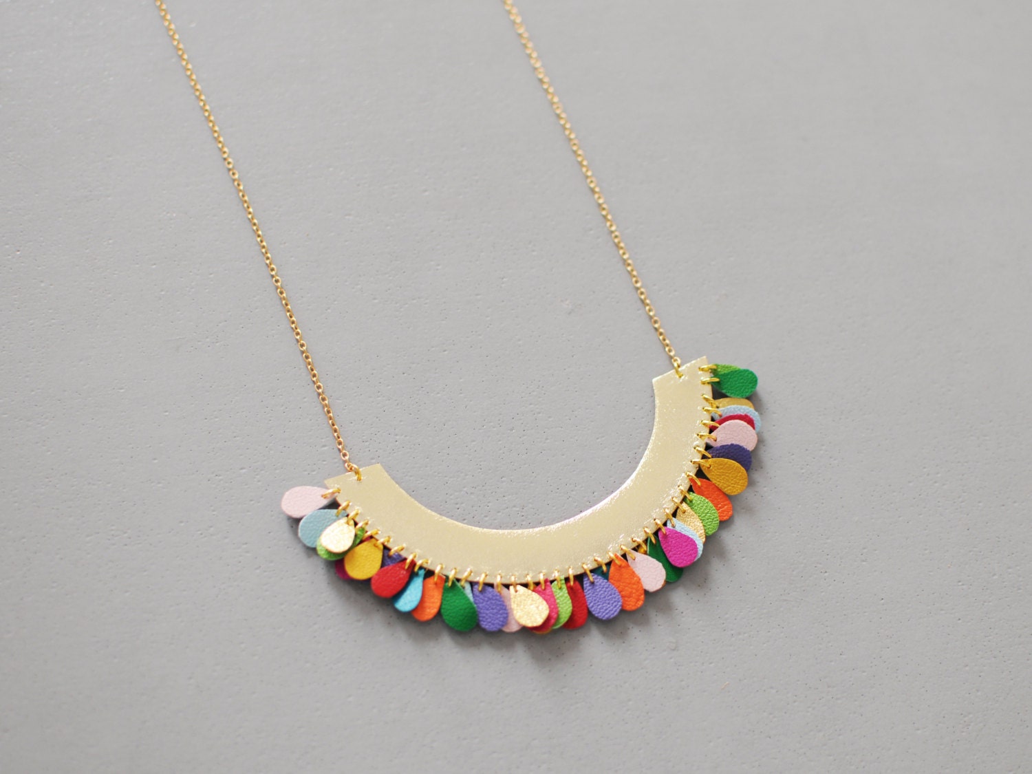 Handmade half circle necklace in gold leather and