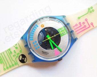 Swatch 'Computrip' GN108 watch, visible mechanism and circuit board pattern strap // 45 USD