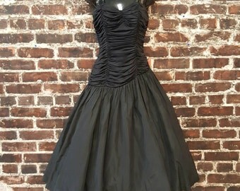 1950s Black Prom Dress. Black 50s Party Dress. Full Skirt with Sweetheart Neckline, Sequin Straps, Asymmetrical Ruched Bustier.