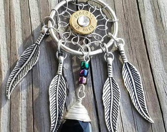 Dream catcher necklace with a 45 caliber casing and a crystal swarovski crystal