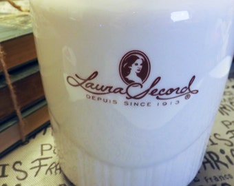 Vintage (c. 1970s) Laura Secord ceramic Cookie Jar or canister with tight-fitting, vacuum-sealed lid.