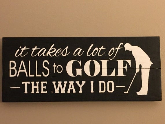 It takes a lot of balls to golf the way I do sign golf sign