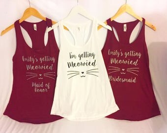 I'm getting meowied racerback tank top! Getting meowied with cat face and whiskers, shes getting meowied! Buy 5, the 6th is free!