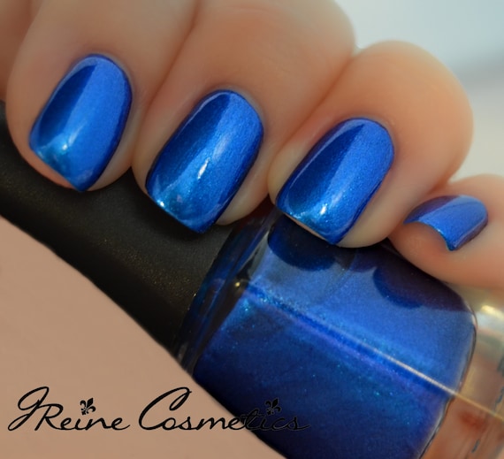 Sexy Sapphire Sapphire Blue With Blue Sparkle Nail Polish
