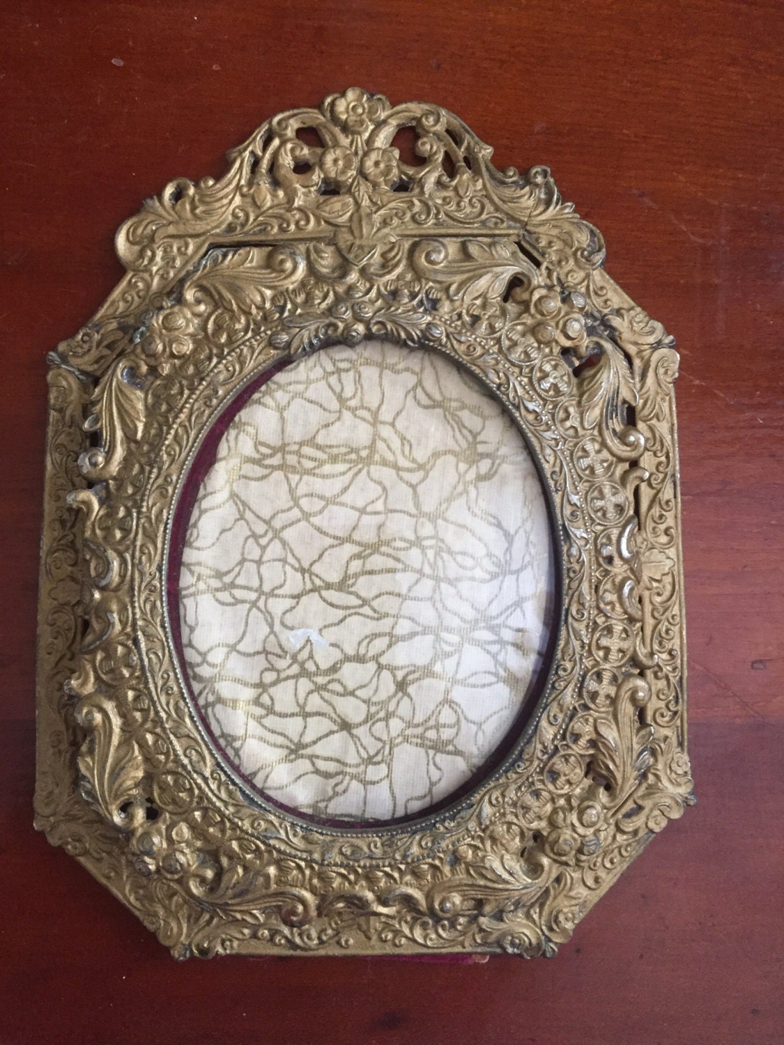 antique small round ornate frame