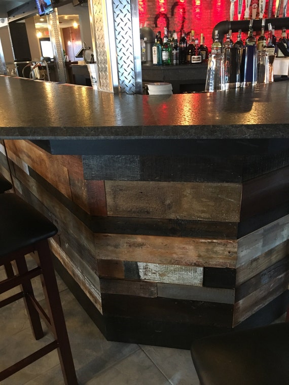 Reclaimed wood plank bar Tap and grill bar face