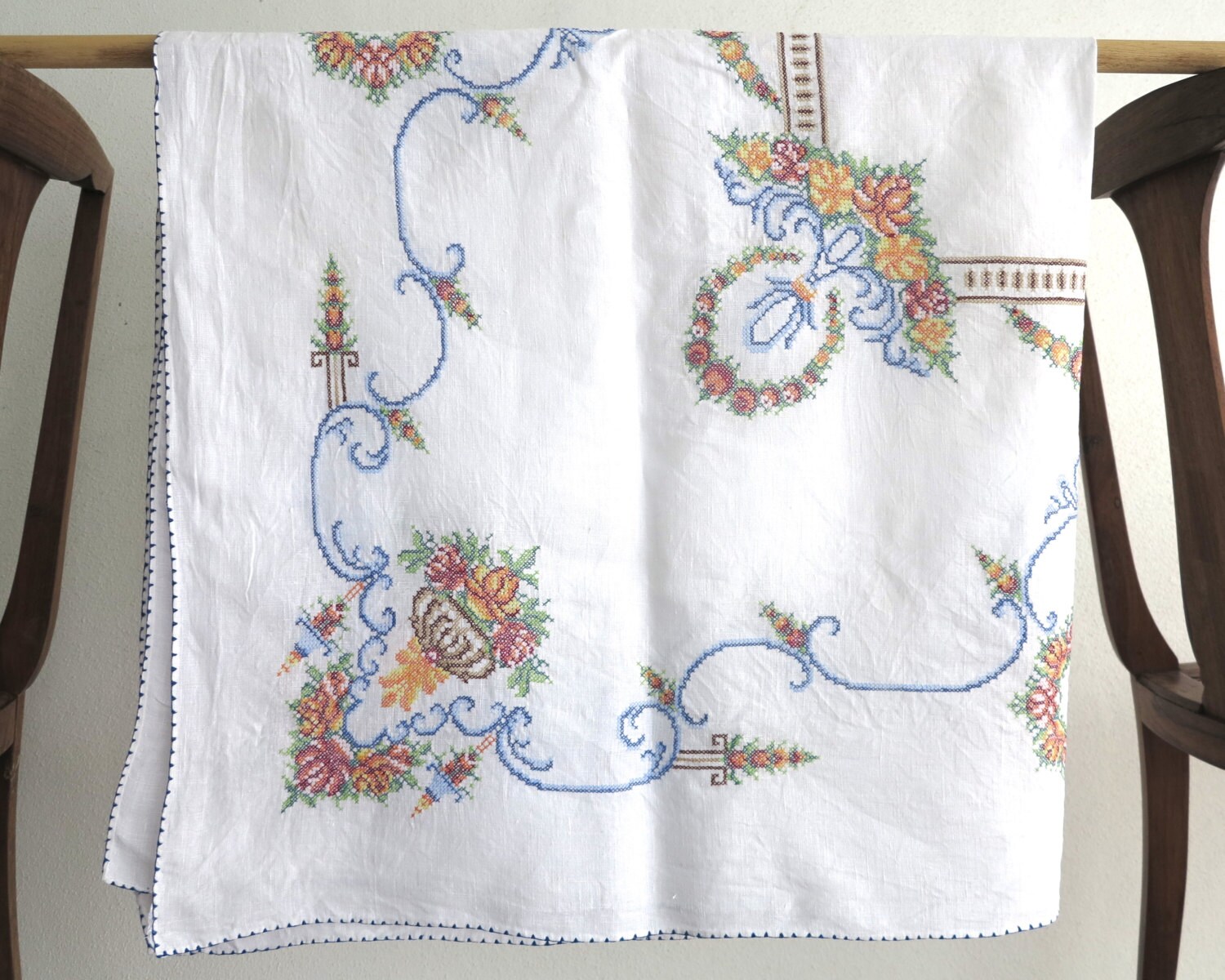 Hand embroidered square tablecloth with cross stitched floral
