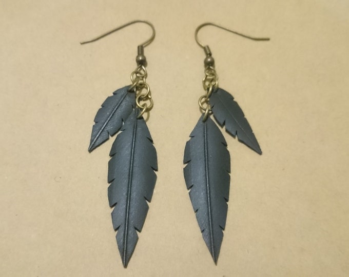 Bicycle inner tube large double feather earrings