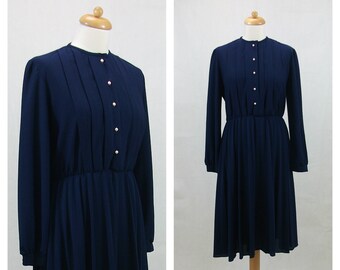 70s vintage dress. Navy blue dress. Shirtwaist dress. Pleated dress. Secretary dress. Midi dress. Size L.