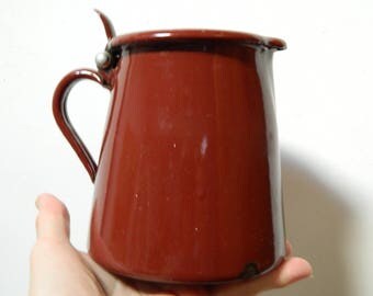 Vintage enamel milk jug