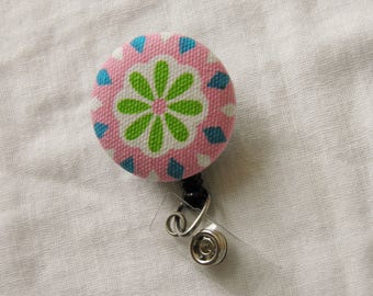 Flower badge reel, ID holder, retractable badge