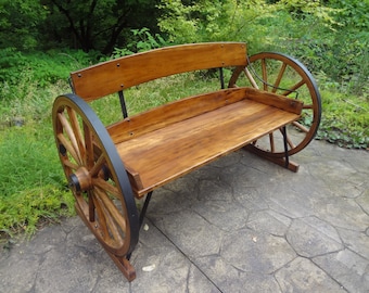 Wagon wheel bench. Very rustic, very well made.