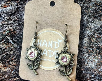 Southern Bullets. Bullet jewelry. Sun flower. Antiqued brass. Bullet earrings. Handmade. 9mm. Country girl. Southern belle. Flower earrings.