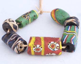 7 Antique venetian millefiori glass trade beads. African Trade